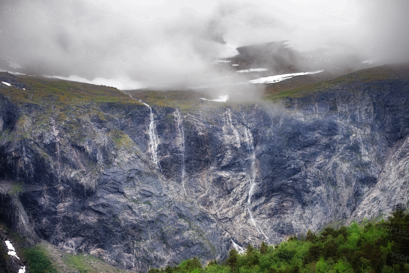 Buy stock photo Morning, waterfall and mountains with stream in winter for travel, climbing and hiking. Landscape, nature and view of natural environment, clouds and Norway countryside for calm adventure on rocks