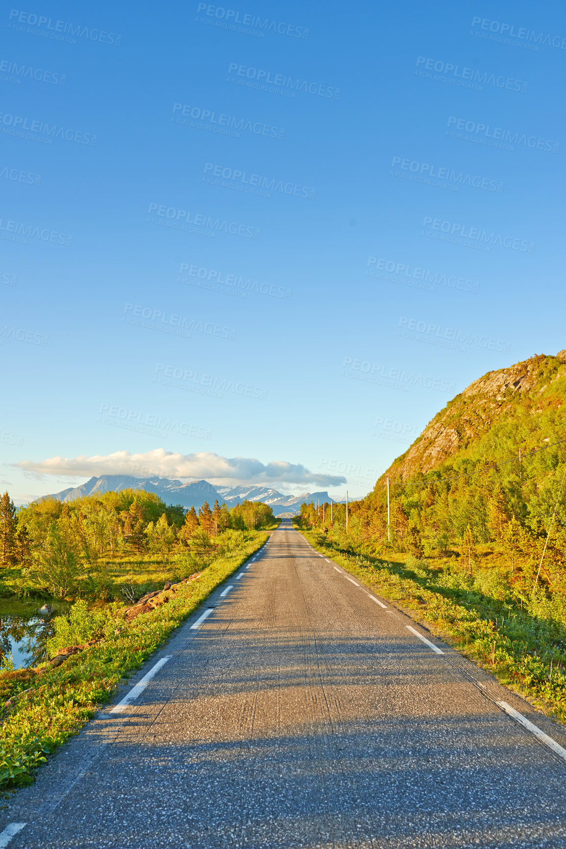 Buy stock photo Nature, road and sky with clouds by mountains, fjord and trees for transport system in summer. Landscape, mockup and space with highway, infrastructure and travel in environment by street in Norway