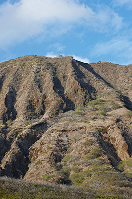 Buy stock photo The Koko Head Volcano in Oahu, Hawaii. An extinct volcano crater up a mountain in summer. A beautiful view of a sightseeing location or landmark outdoors. A natural vacation destination for tourism