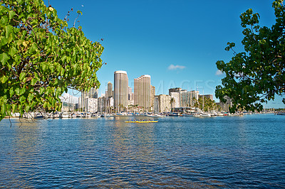 Buy stock photo City, sea and sky with business buildings outdoor in Hawaii, USA for commercial or corporate trade. Background, infrastructure and nature with architecture in urban town for work in sunny environment