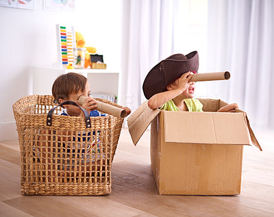 Buy stock photo Shot of two young boys playing make believe as pirates