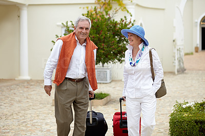 Buy stock photo Travel, suitcase and elderly couple walking on vacation in a holiday location happy in retirement together by a hotel. Bag, smile and senior people on a journey or man and woman walk in happiness