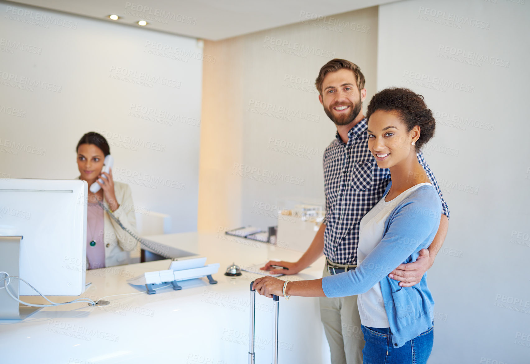 Buy stock photo Receptionist, couple and portrait for check in, welcome and help desk with friendly service. Happy man, woman and people with luggage, hospitality or holiday for hotel or lodge vacation with suitcase