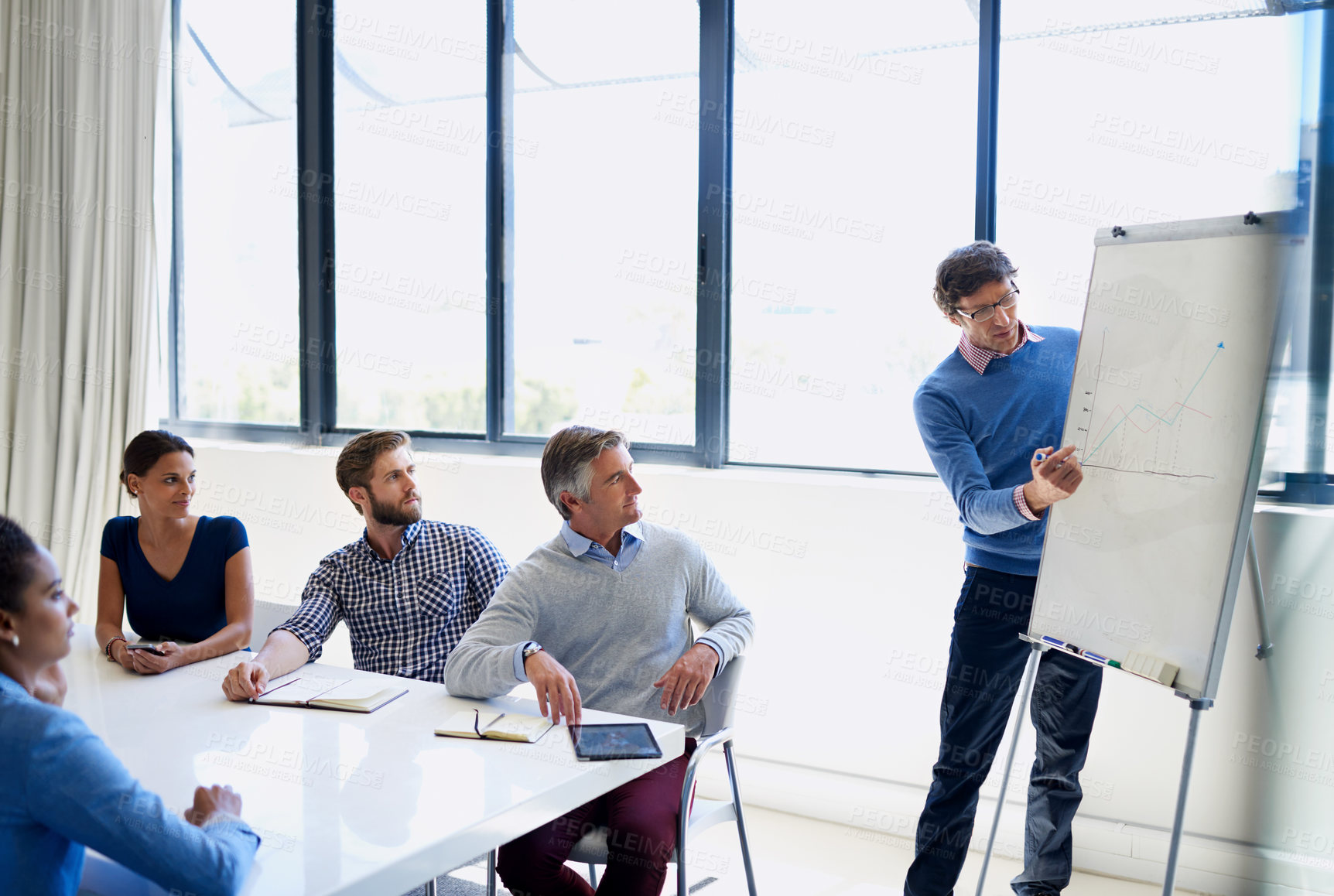 Buy stock photo Corporate, man and presentation with statistics on whiteboard at office for report and company growth. Employees, people and boardroom on meeting with feedback, review and analysis on finance revenue