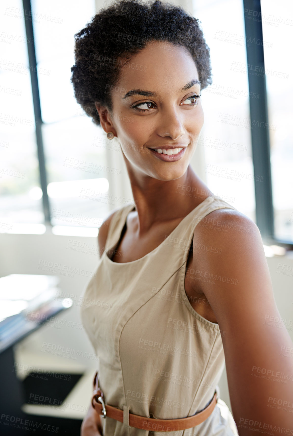 Buy stock photo Shot of an ambitious young businesswoman in her office