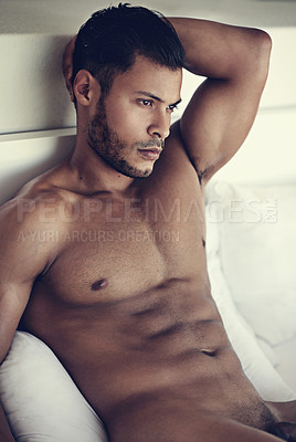 Buy stock photo Shot of a handsome naked man in bed in the morning