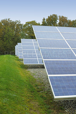 Buy stock photo Solar power installation in Denmark. Photovoltaic solar cell panels as renewable energy source. Blue solar panels generating electricity in solar power station, alternative energy from nature