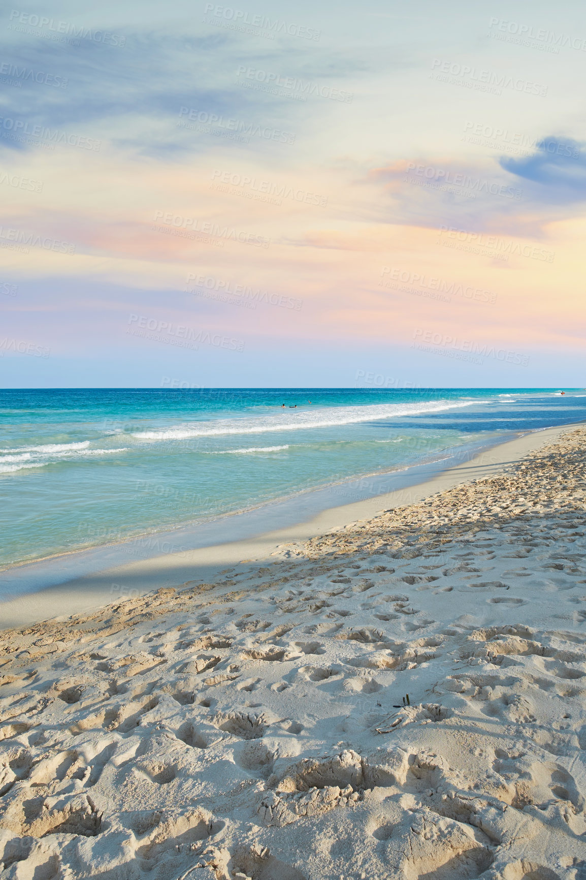 Buy stock photo Sunset, ocean and footprints in sand for travel, vacation or holiday in summer by coastal island. Walk imprint, steps and sea waves on LaniKai beach for tropical weekend trip at destination in Hawaii