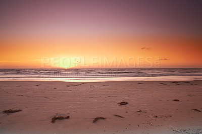 Buy stock photo Sand, horizon or coast at sea at sunset with calm, peace or zen background for holiday, travel or vacation. Landscape, sky or view of ocean, nature or beach in Denmark for break, paradise and trip