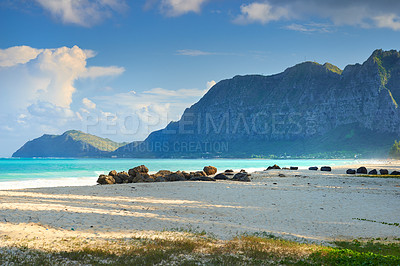 Buy stock photo Mountains, beach or water with sky, sand or ocean in nature or environment with grass or travel destination. Horizon view, park or paradise in natural background, holiday location or beach in Hawaii 