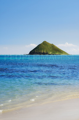 Buy stock photo Ocean, nature and water island in sea, sustainable vacation and Hawaii destination or travel holiday. Summer, beach and outdoor or calm with mountain for relax, shore and coastline with blue sky