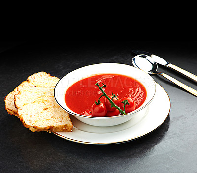 Buy stock photo Tomato, soup and bread on menu in restaurant with bowl of healthy food for weight loos diet with nutrition. Dinner, dish and luxury appetizer course in fine dining kitchen with knife and spoon