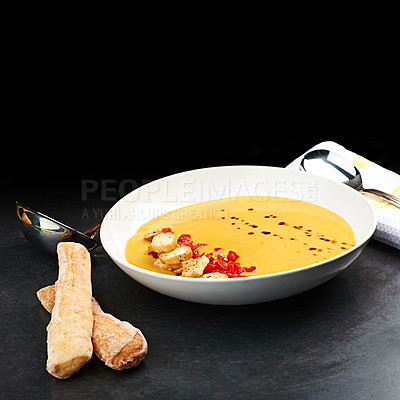 Buy stock photo Vegetable, soup and bread on menu in restaurant with chilli, garlic and healthy food in diet. Dinner, dish and luxury appetizer course with breadsticks in fine dining kitchen or benefits of nutrition