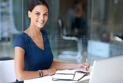 Buy stock photo Cropped shot of an attractive businesswoman at work in an office