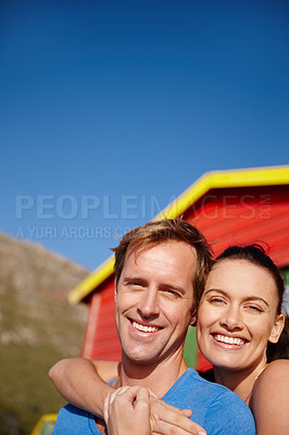 Buy stock photo Cropped shot of a couple on a beachside holiday