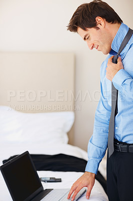 Buy stock photo Business man, laptop and tie in bedroom for preparation, typing or ideas for problem solving in home. Lawyer, computer or start morning with scroll, solution or planning for decision in legal process