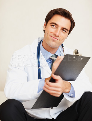 Buy stock photo Clipboard, thinking doctor and happy man writing medical report plan, hospital information or medicine notes. Brainstorming cardiology ideas, checklist and expert planning clinic healthcare paperwork