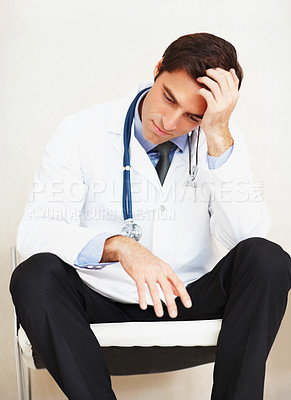 Buy stock photo Burnout, mental health and sad doctor, man or surgeon depressed over medical mistake, wellness services crisis or disaster. Hospital risk, cardiology fail and tired from clinic healthcare work