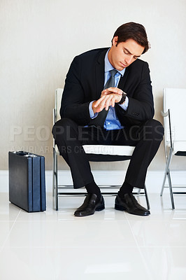 Buy stock photo Business man, check watch and interview at office with thinking for schedule, date or time with case on chair. Entrepreneur, clock and waiting room for recruitment, ideas and onboarding with hiring