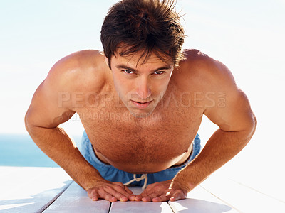 Buy stock photo Young man, push up and portrait with training for health body, fitness and exercise by sky background. Model, confident and natural glow for wellness and muscle workout on plank on summer vacation