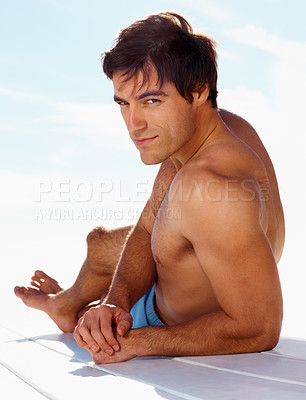 Buy stock photo Portrait, relax and shirtless man on a deck with a view of the sea in summer while on holiday or vacation. Freedom, water or sky and the body of a young tourist tanning outdoor on a pier with space