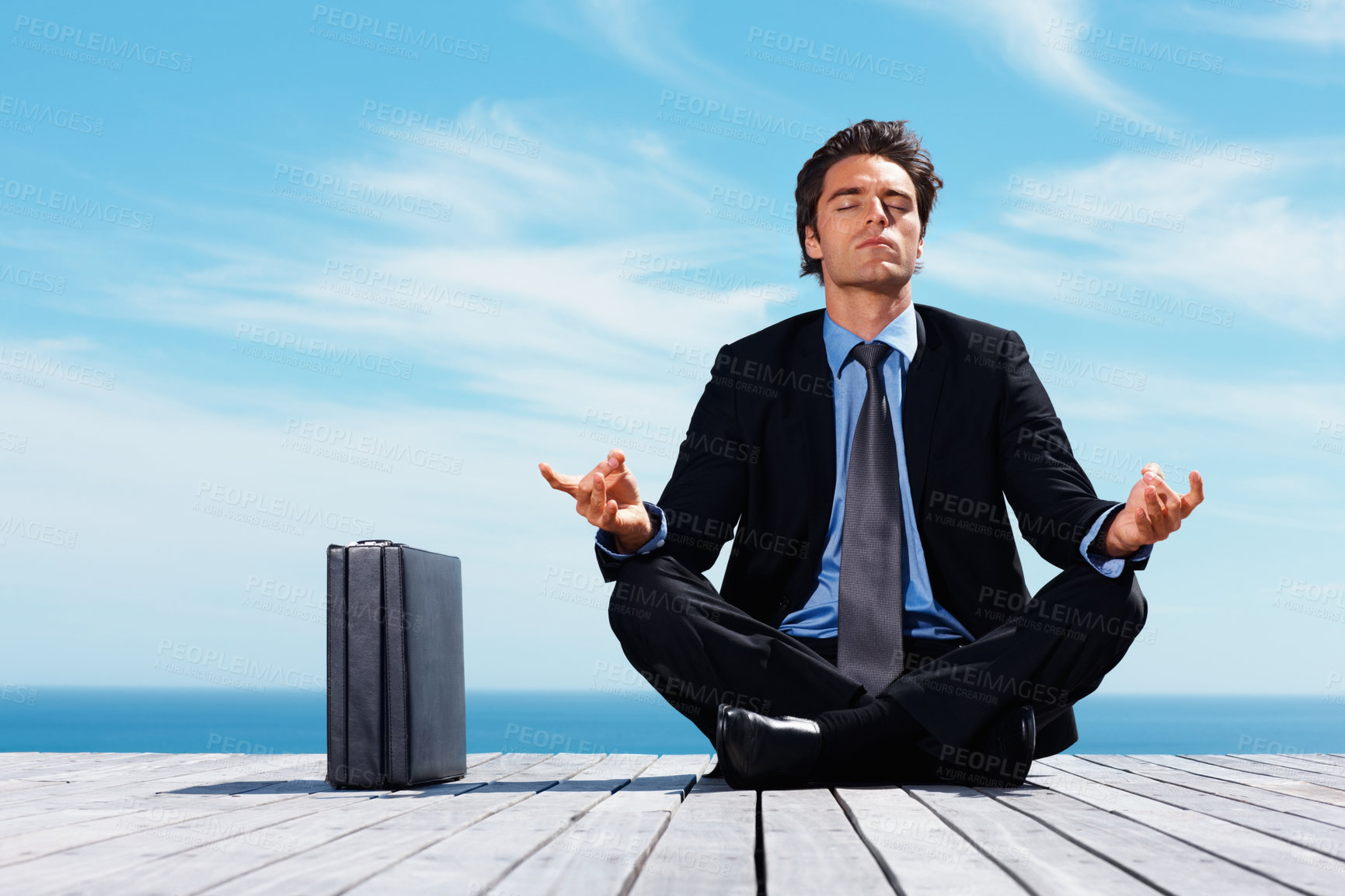 Buy stock photo Meditation, briefcase and business man on blue sky for relaxing, positive mindset and solution. Corporate person, thinking and worker outdoors in yoga pose for mental health in career, work and job
