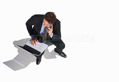 Buy stock photo Business man, phone call and top view of laptop, listen to conversation or communication on white studio background mockup space. Computer, mobile chat and lawyer consulting, legal advice and above