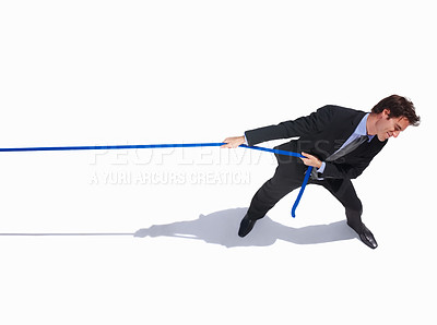 Buy stock photo Businessman, frustrated and tug of war by white background, career challenge and industry competition. Young person, mental health and professional worker with rope, top view and job battle in studio