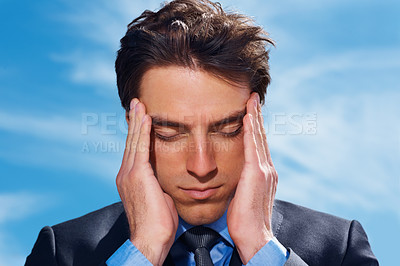 Buy stock photo Businessman, headache and stress or burnout, mental health and frustrated by debt and audit. Professional, male person and migraine or fatigue, anxiety and massage temple or brain fog and blue sky