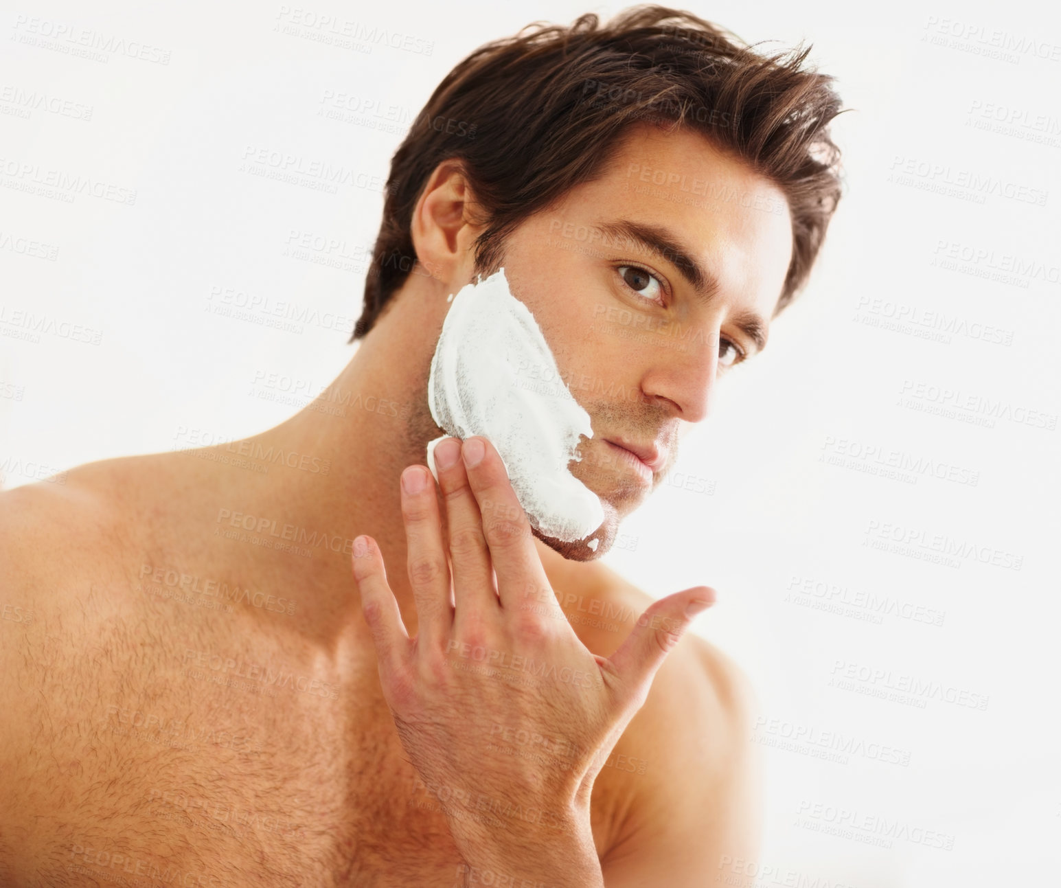 Buy stock photo Shaving, cream and face of man in morning, grooming routine and hair removal in bathroom. Cosmetics, beauty and hand with foam, soap or person with self care in home for wellness of skin and body