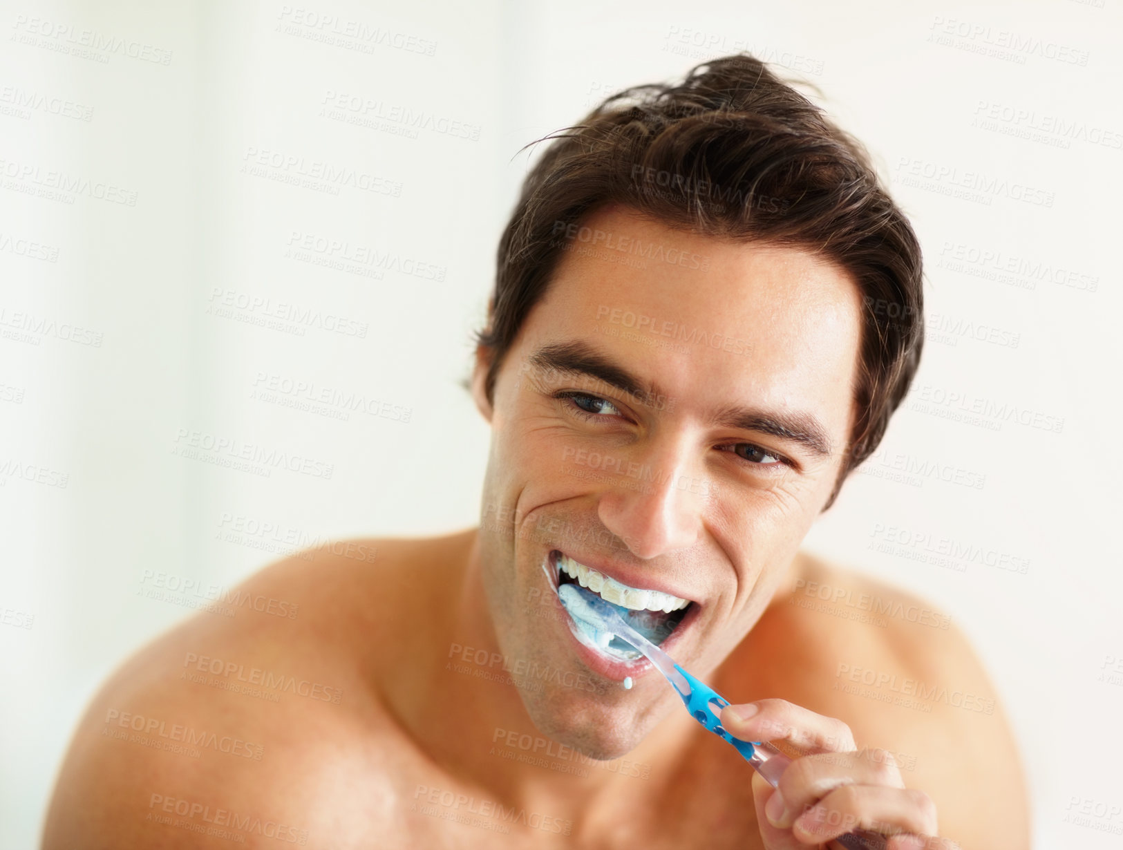 Buy stock photo Bathroom, brushing teeth and man with oral health, wellness and grooming routine for fresh breath. Person, home or guy with toothbrush, cleaning his mouth and morning with dental hygiene or self care