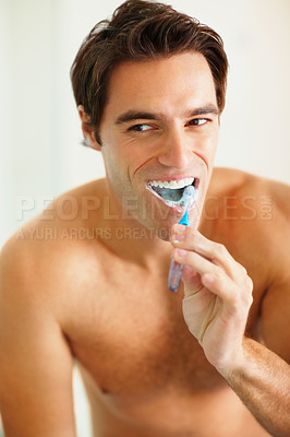 Buy stock photo Bathroom, brushing teeth and man with oral hygiene, wellness and grooming routine for fresh breath. Person, home or guy with toothbrush, cleaning his mouth and morning with dental health or self care