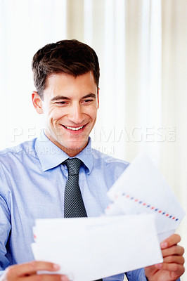 Buy stock photo Businessman, reading and happy in office with paper, administration and company documents. Financial analyst, research and data analysis with strategy for stock, investment and growth of business