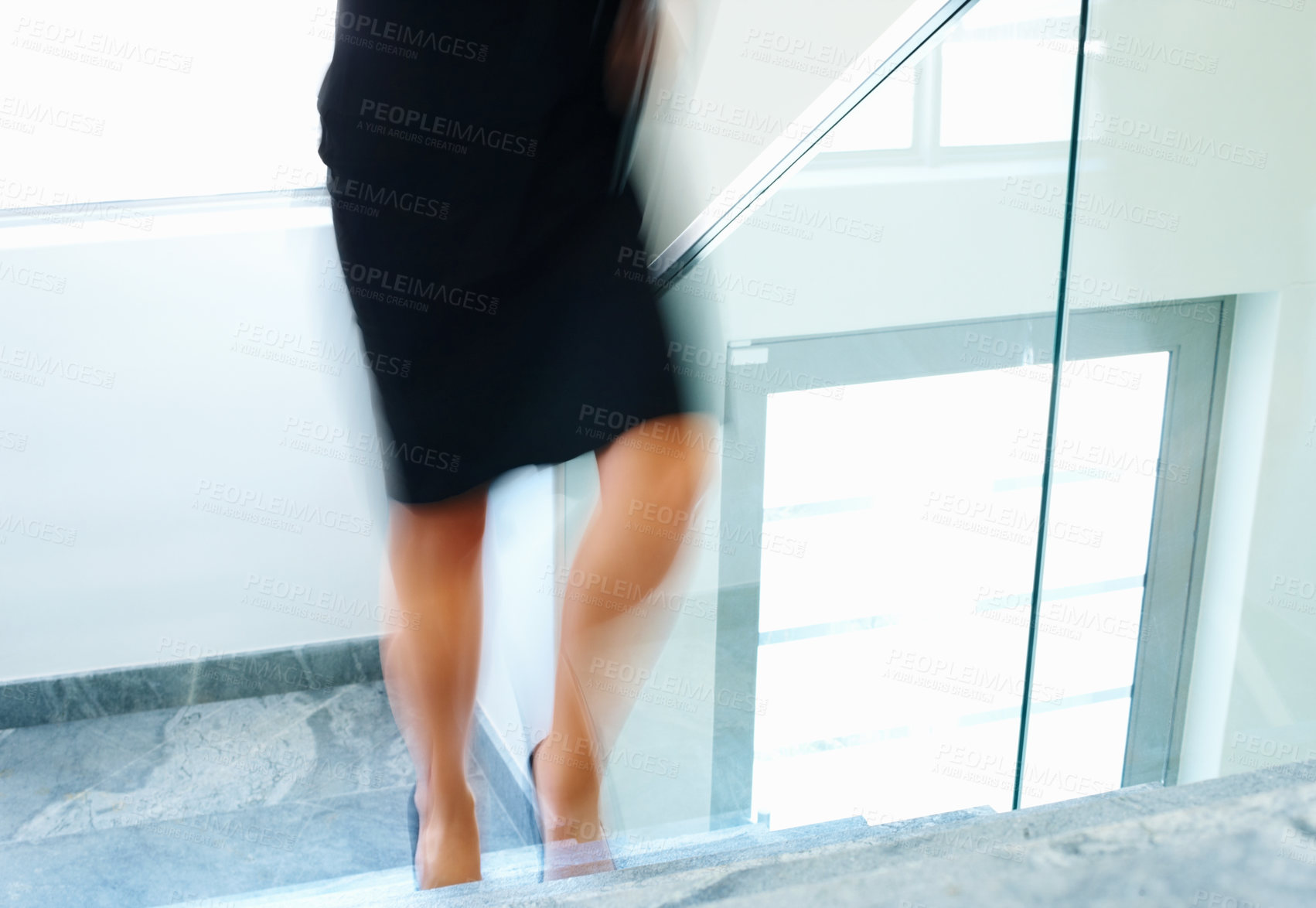 Buy stock photo Walking, stairs and blur of business woman in rush for meeting, working and job in office. Corporate, professional and legs of worker with speed for commute, travel and moving for career in workplace