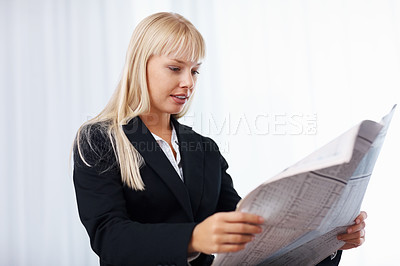 Buy stock photo Businesswoman, reading and newspaper for information in office for research, update or financial news. Corporate, manager and looking for article, page or headline for investment, stock or growth