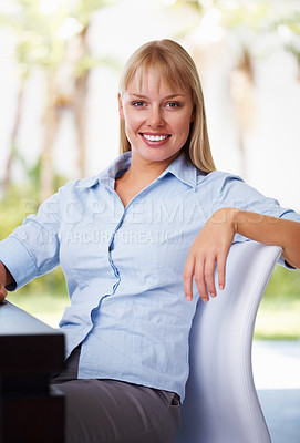 Buy stock photo Portrait, smile and business woman on chair at desk outdoor, remote work or freelance. Job, happy professional entrepreneur at table or confident consultant, employee or blonde worker in Switzerland