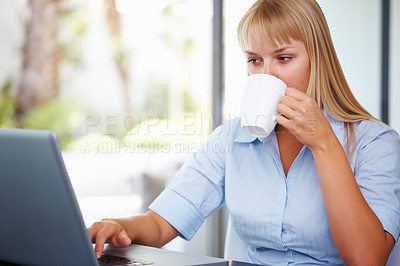 Buy stock photo Coffee, typing and woman in office with laptop, market research or online website review. Businesswoman at desk with drink, professional communication career and administration job at startup agency.