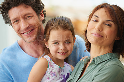 Buy stock photo Portrait of a little girl with her mother and father