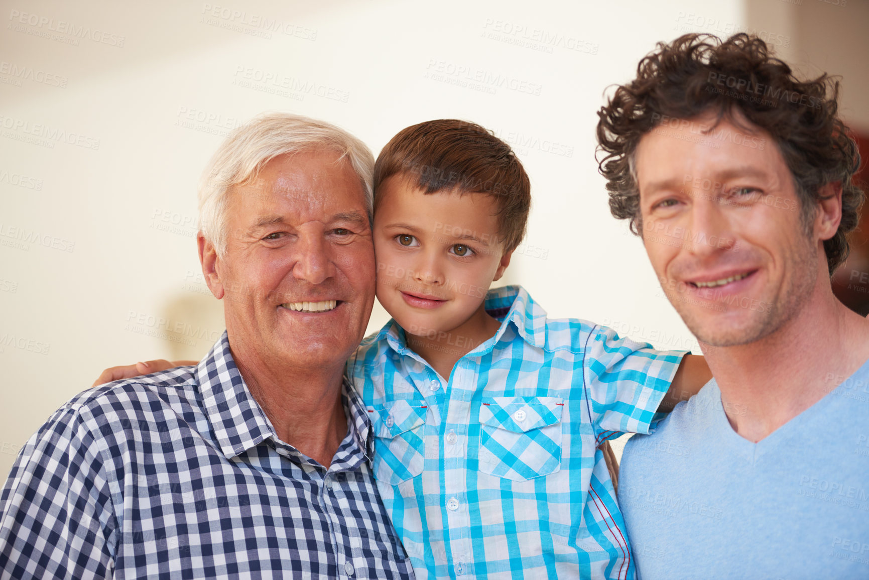 Buy stock photo Portrait of a little boy with his father and grandfather