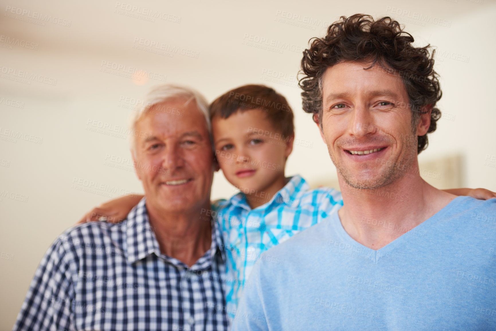 Buy stock photo Portrait of a little boy with his father and grandfather