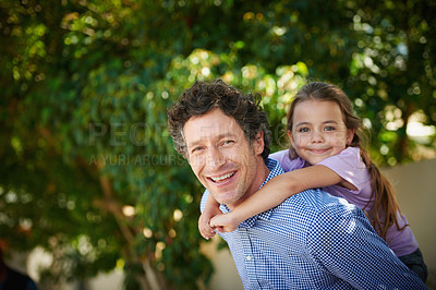 Buy stock photo Portrait of a father giving his daughter a piggyback ride outside