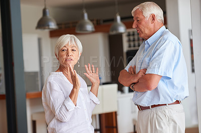 Buy stock photo Shot of a senior couple having an argument