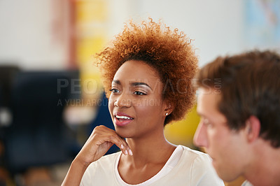 Buy stock photo Shot of a beautiful young professional in a casual office environment