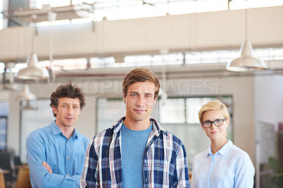 Buy stock photo Cropped portrait of three businesspeople standing in the office