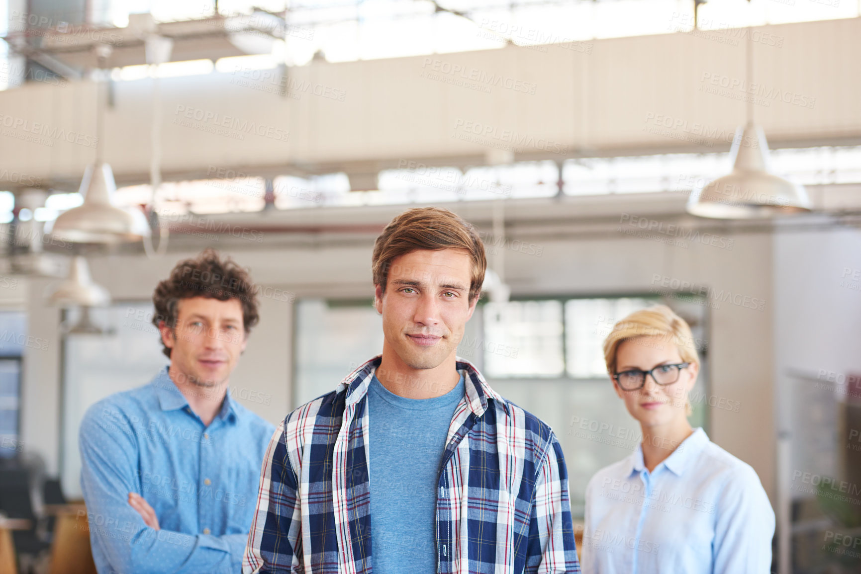 Buy stock photo Cropped portrait of three businesspeople standing in the office