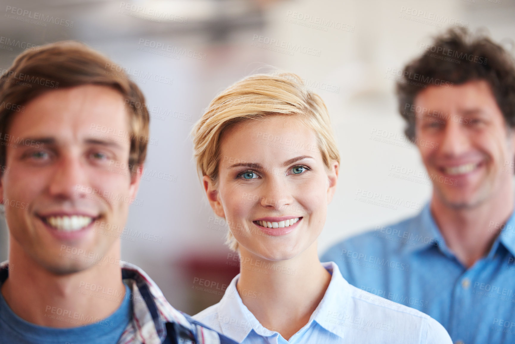 Buy stock photo Cropped portrait of three businesspeople standing in the office