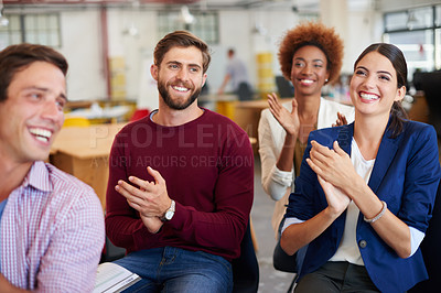 Buy stock photo A group of colleagues applauding a work presentation