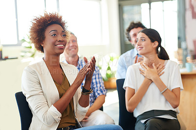 Buy stock photo A group of colleagues applauding a work presentation