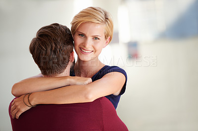 Buy stock photo Shot of a couple working together in an open office