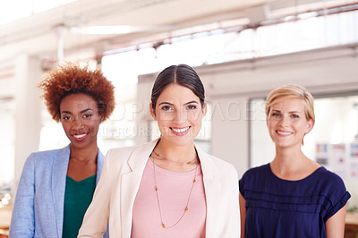 Buy stock photo Portrait of three female coworkers standing in an office